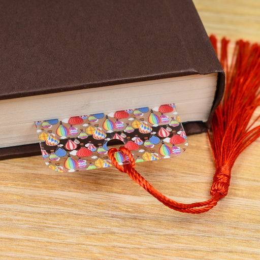 a book with a tassel on top of it