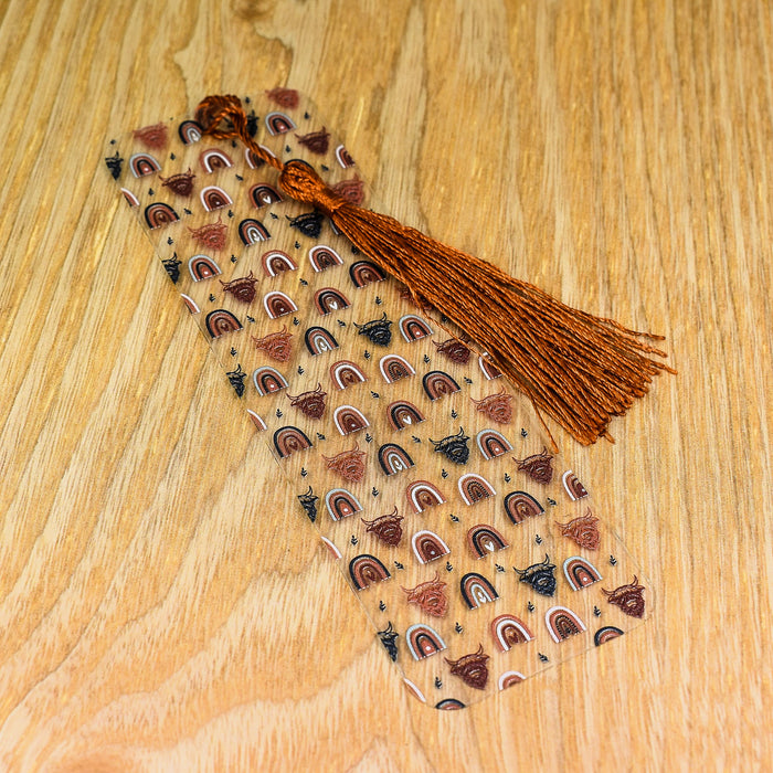 a wooden table topped with a tie on top of a wooden table