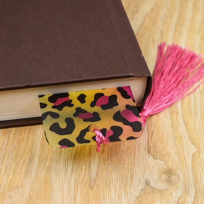 a book with a tassel on top of it