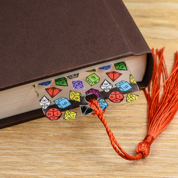 a book with a tassel on top of it