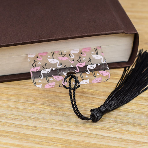 a book with a tassel on top of it