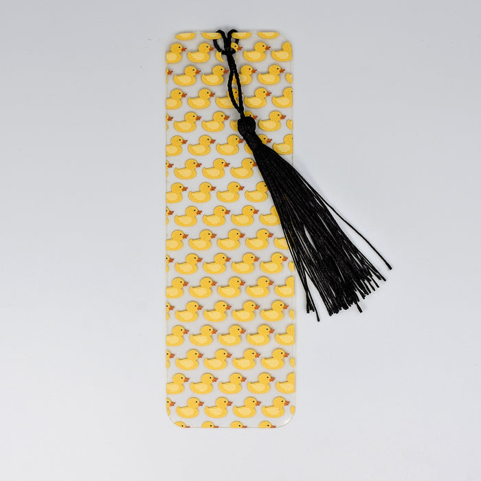 a bookmark with yellow rubber ducks on it