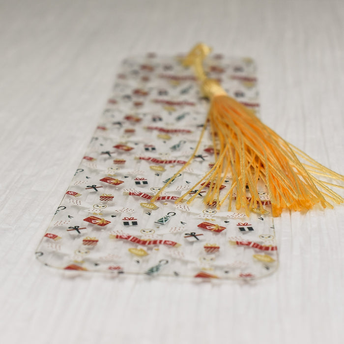 a white table with a yellow tassel on top of it