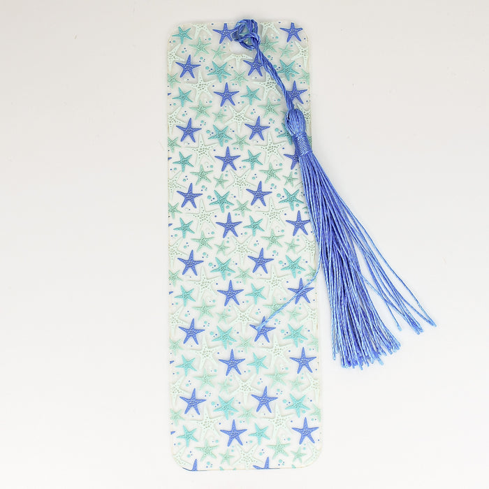 a bookmark with blue and white stars on it