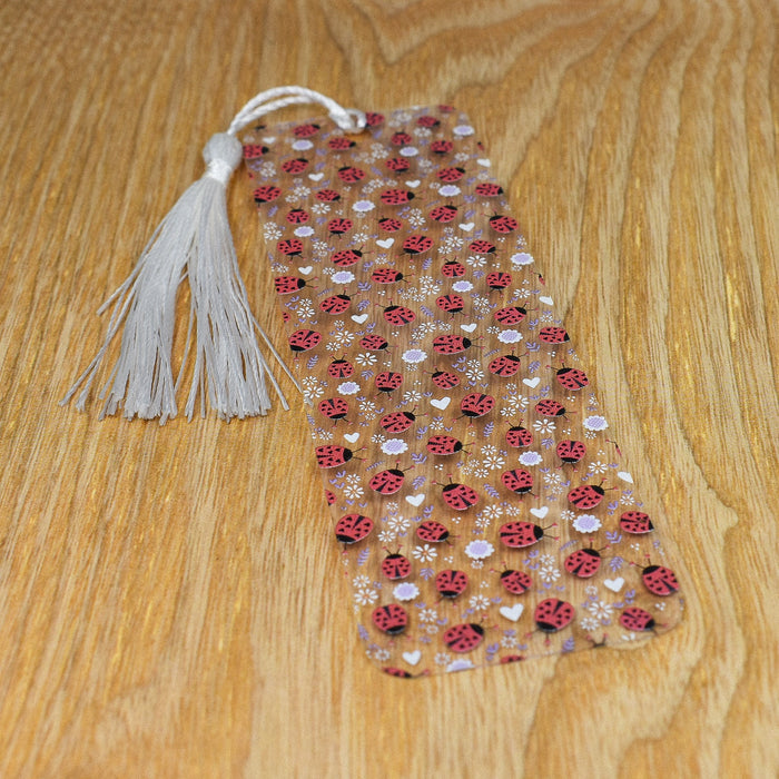 a red and white tie on a wooden table