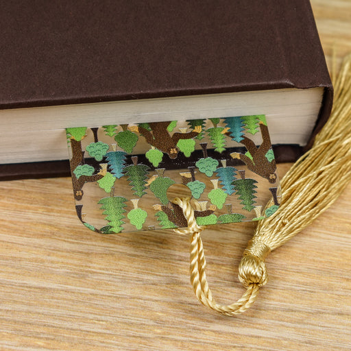 a book with a tassel on top of it