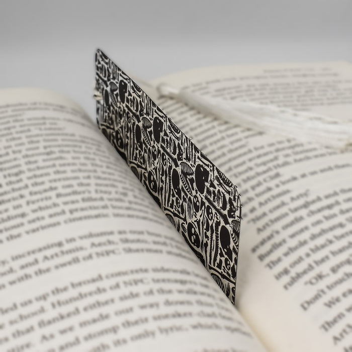 an open book with a black and white pattern on it