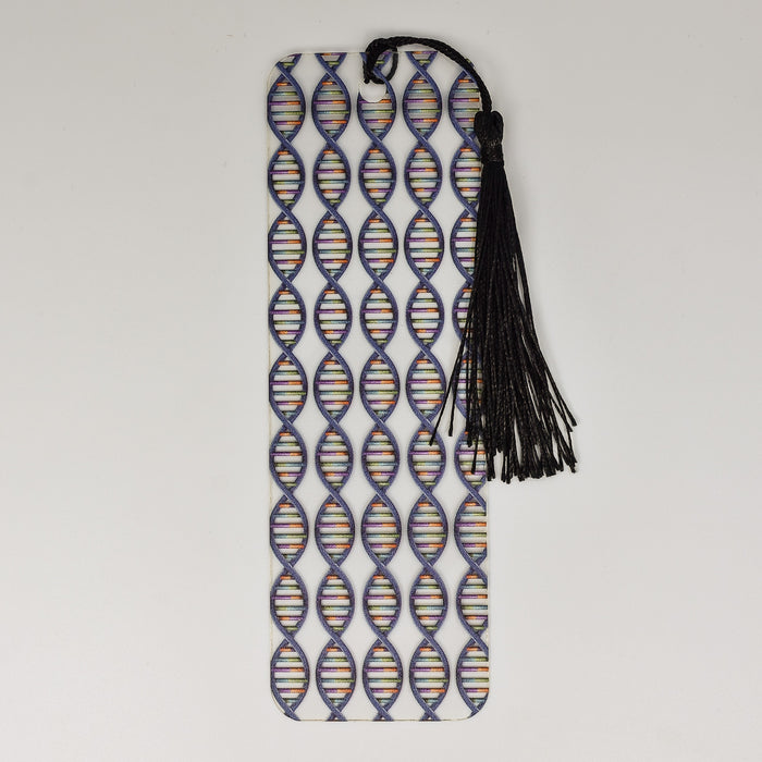 a bookmark with a black tassel hanging from it