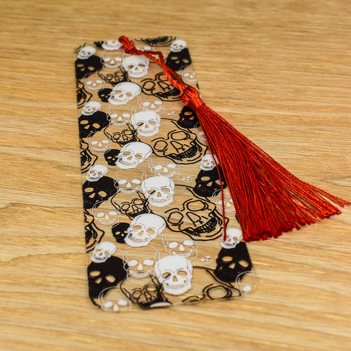a bookmark with skulls and skulls on it